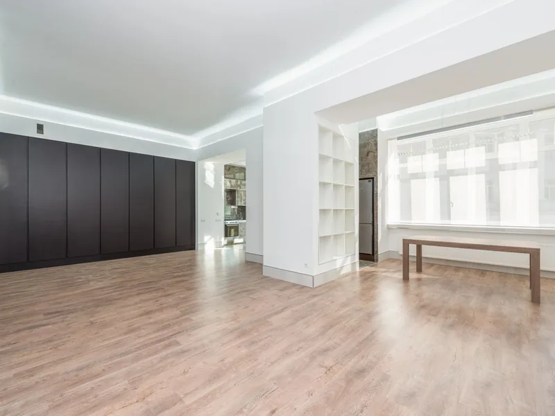 Wide-plank wood-look LVP flooring in a bright coastal living room